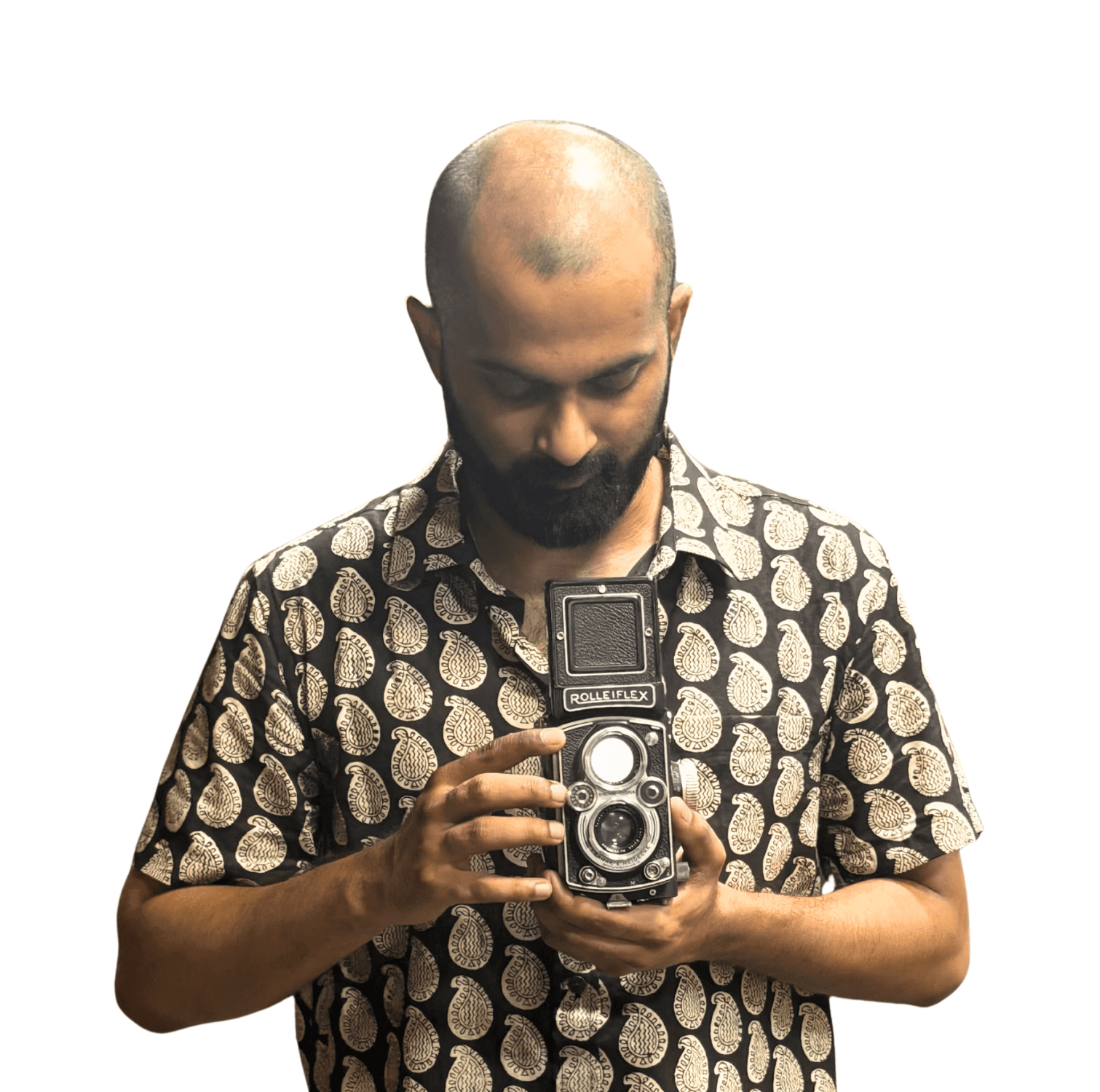 man holding a vintage camera