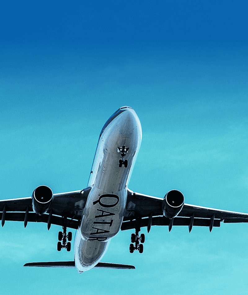 Commercial airplane taking off against a clear blue sky