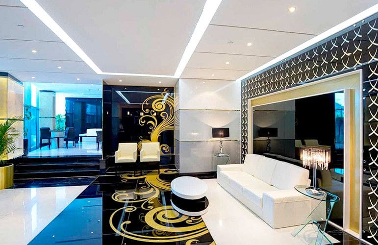 Contemporary interior lounge and seating area in DAMAC Park Towers for residents and guests.