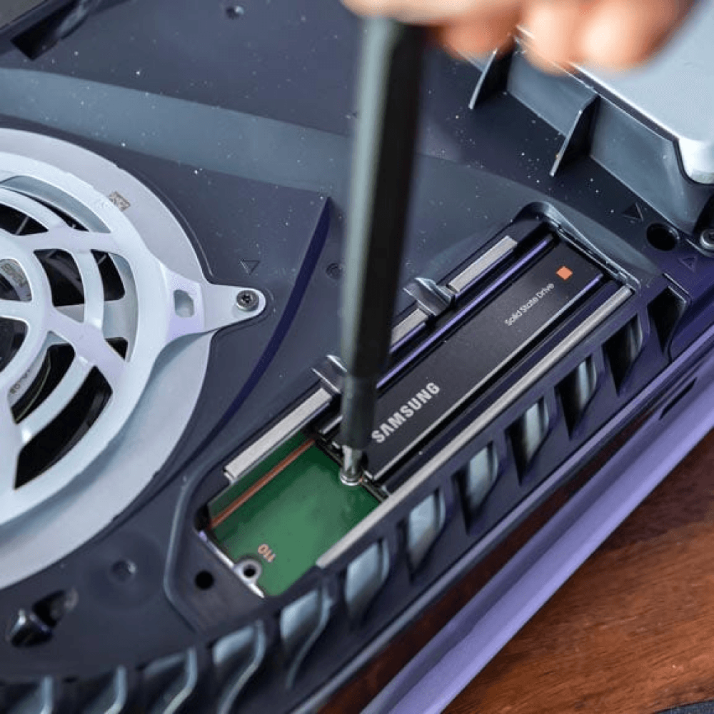 How To Add More PS5 Storage: Install a Second SSD, Secure and tight the SSD in expansion slot