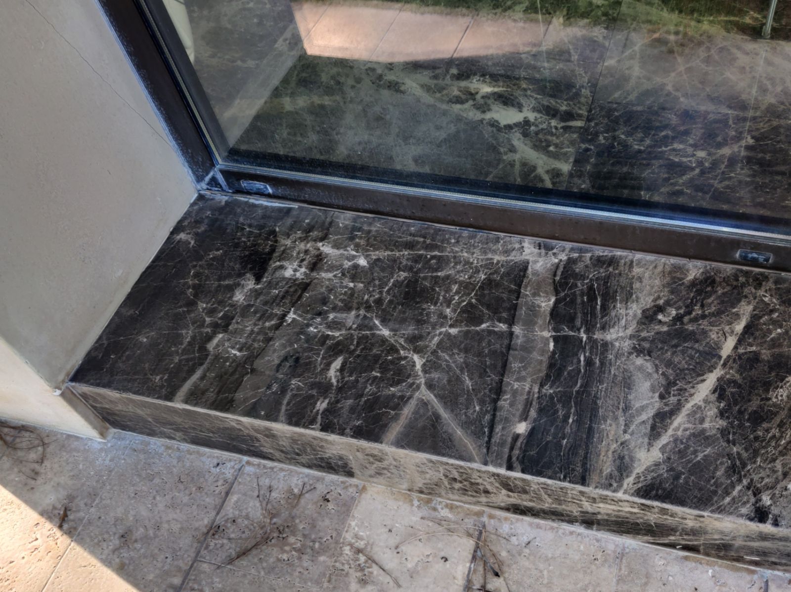 Dark marble threshold, after treatment