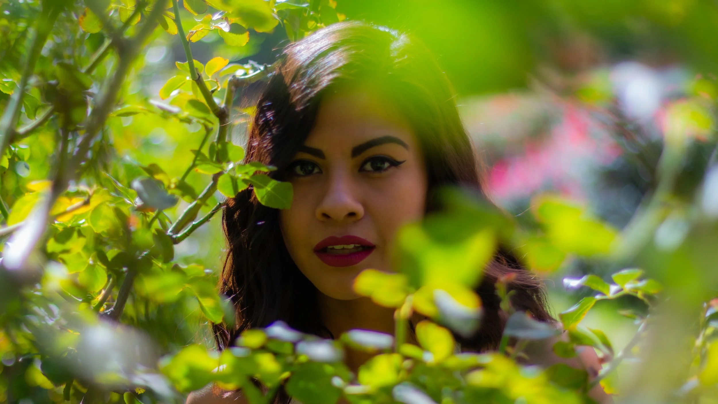 Lou and Josuse holding a cold brew cup with their otter logo on the right corner and cold brew lou written in front