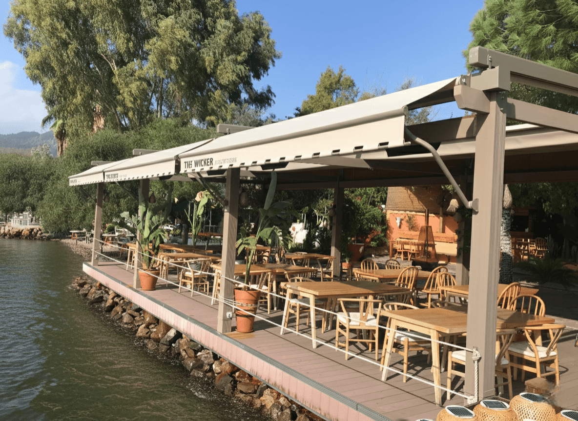 husband and wife working happily on a laptop