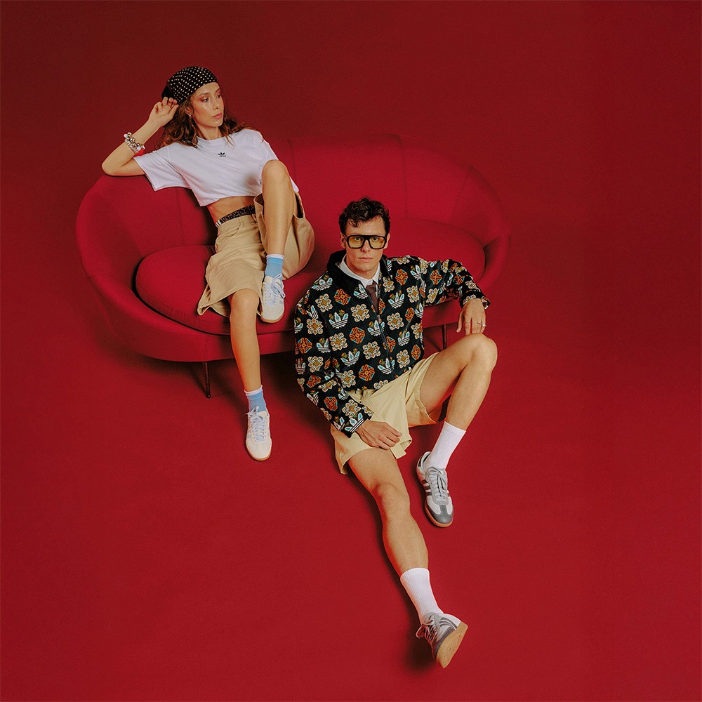 Streetside billboard with flyposters of the Batch.Works brand and illustrations