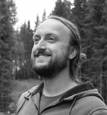 A portrait of a young man smiling