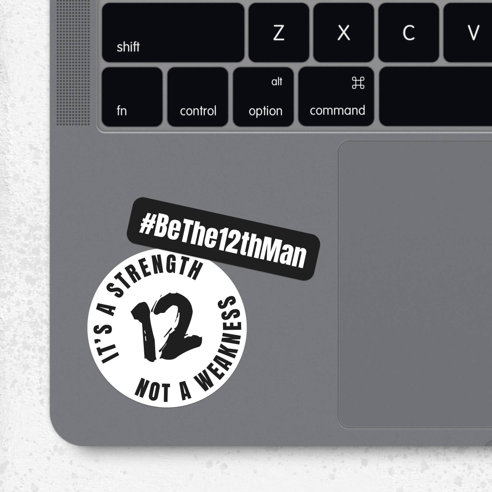 12th Man stickers on laptop