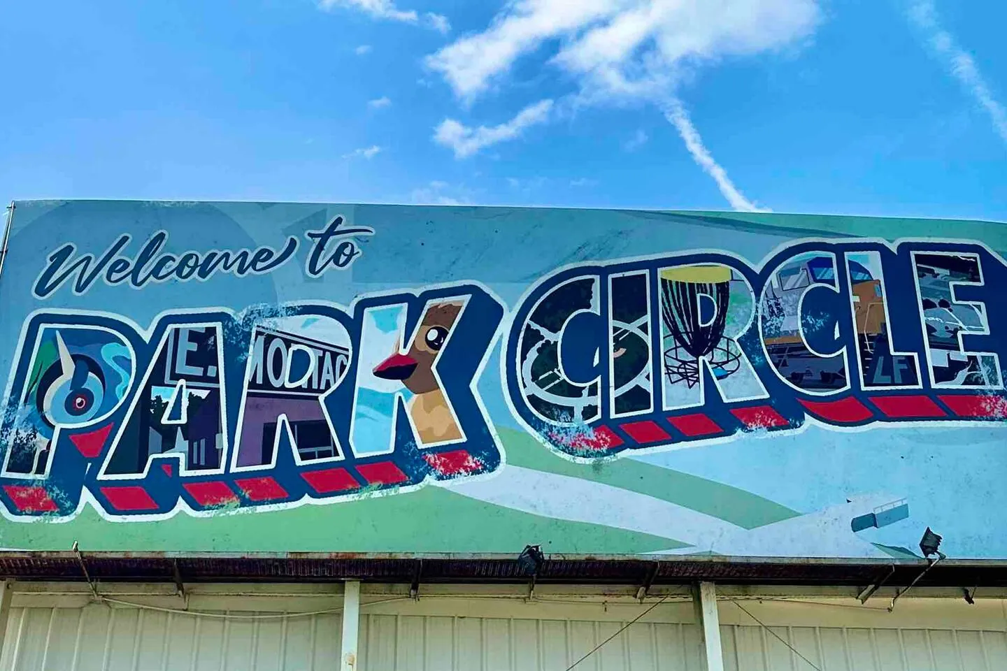 Hand-painted "Welcome to Park Circle" postcard mural