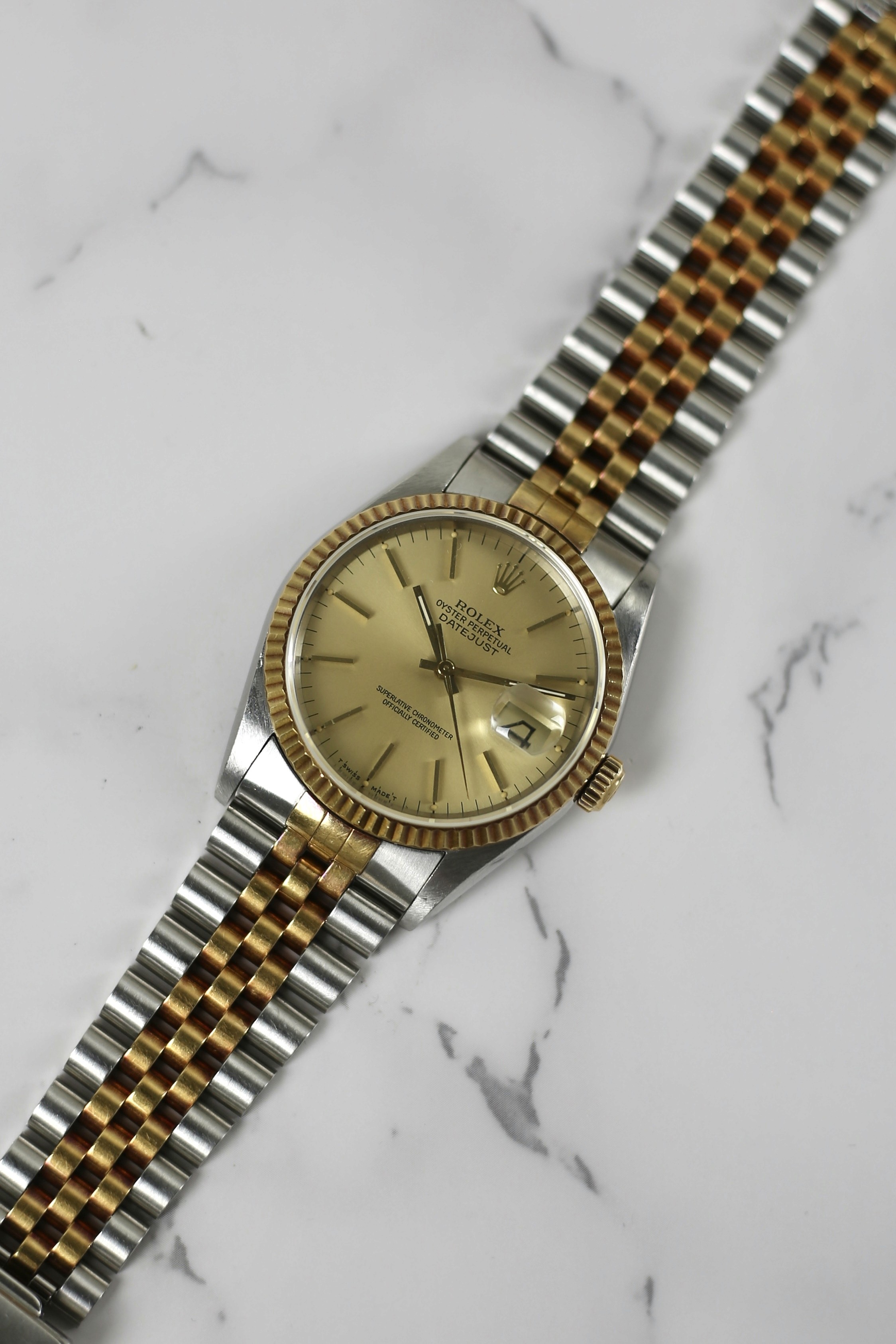 DATEJUST CHAMPAGNE DIAL 18K YELLOW GOLD BEZEL