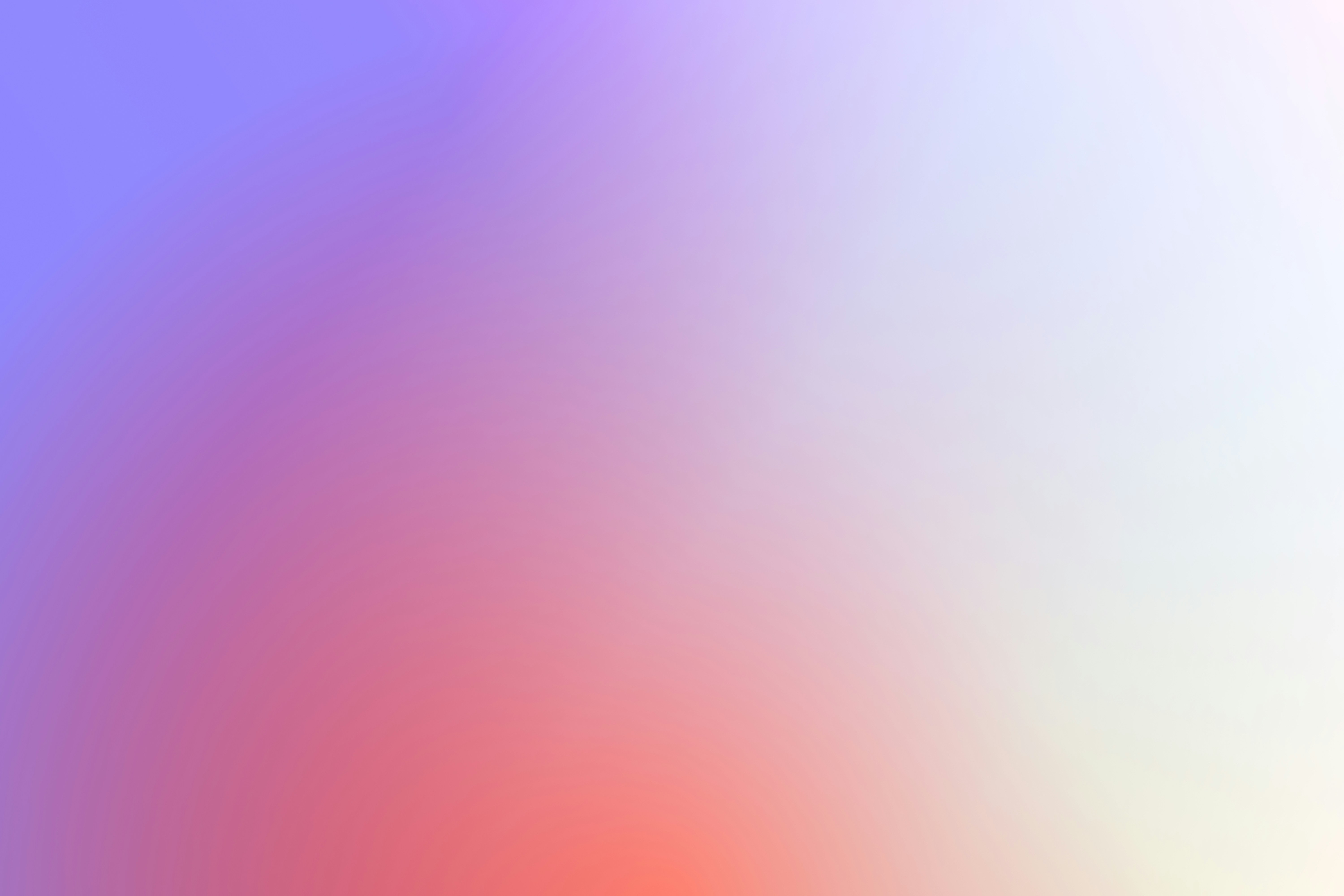 Close-up of a dark green leaf showing its textured surface and central vein against a muted background.