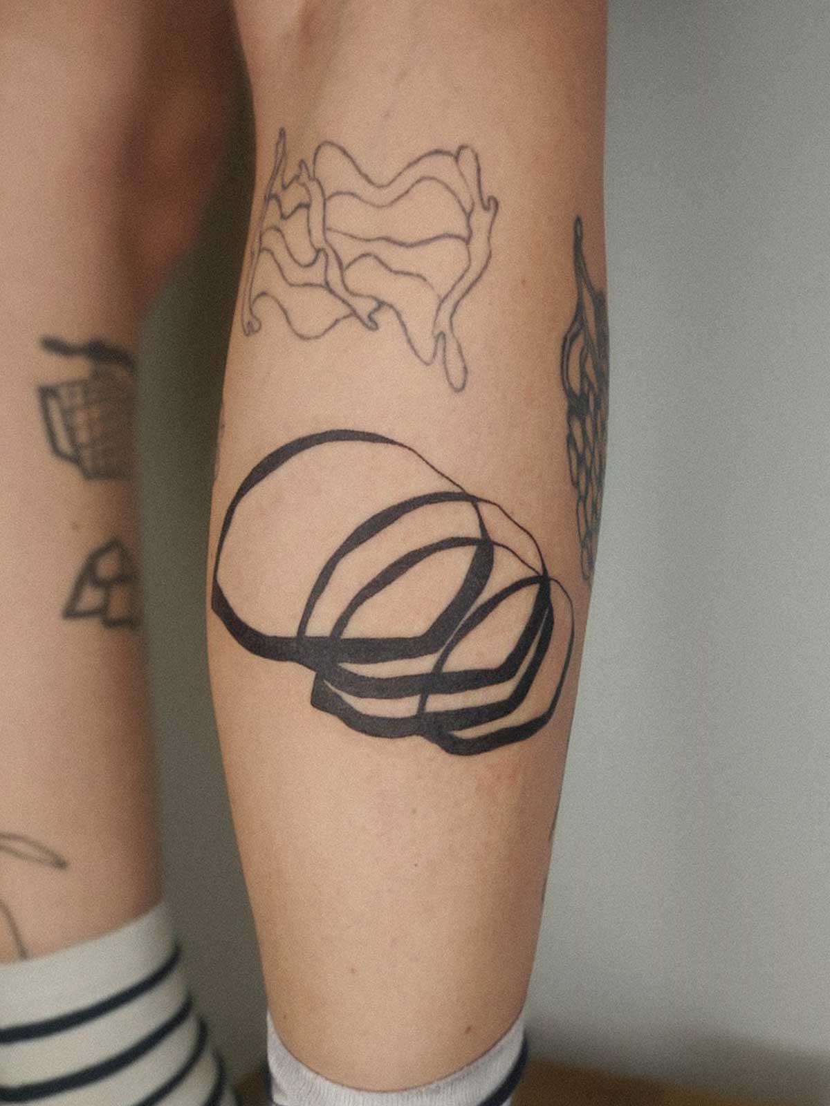 abstract circles tattoo