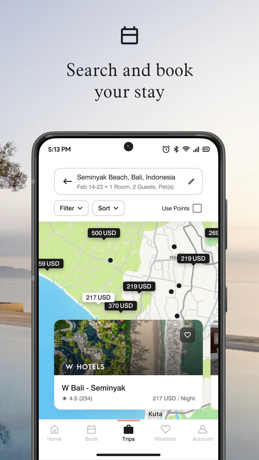Marriott Bonvoy mobile app booking interface "Search and book your stay": map-based hotel search for Seminyak Beach, Bali, Indonesia (Feb 14-23, 1 Room, 2 Guests, Pets) with price-tagged map pins ranging from 217-500 USD, a "Use Points" toggle for redemption-based booking, and a featured listing for W Bali - Seminyak (4.5 stars, 234 reviews, 217 USD/night) — illustrating the seamless integration of cash and points booking within a single search experience
