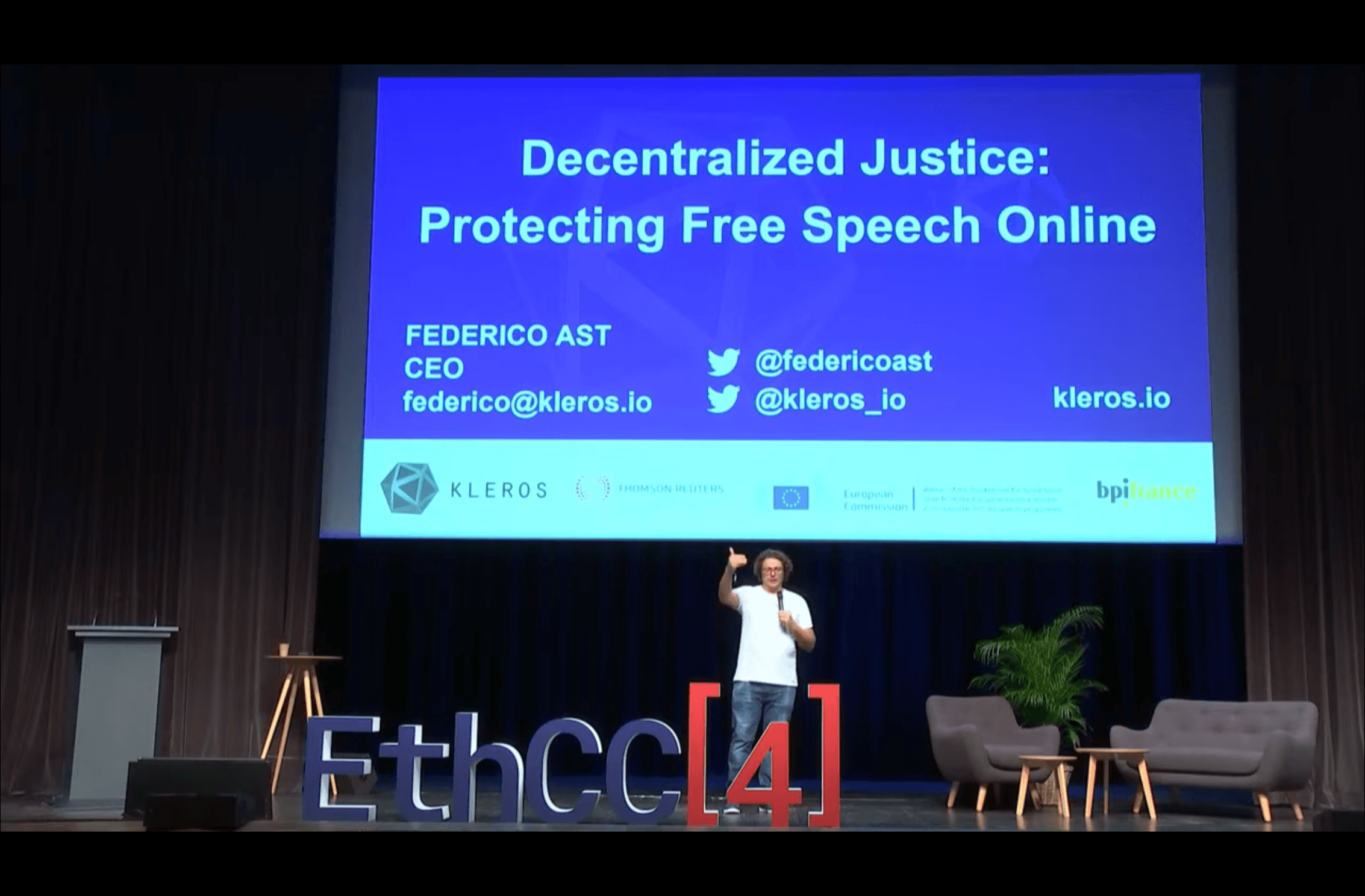 Federico Ast on stage at EthCC[4] presenting on decentralized justice and online free speech.