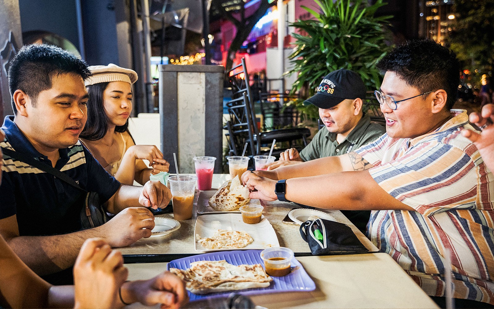 Hawker stalls with diverse dishes on Singapore Street Food & Night Tour.