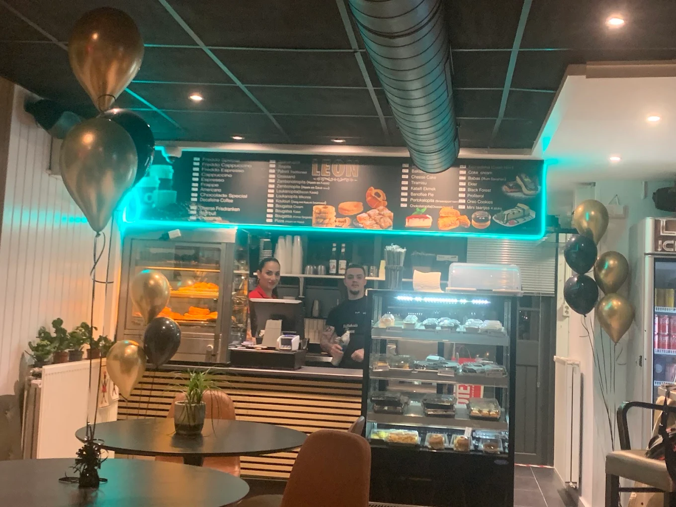 man in black t-shirt holding stainless steel bowl