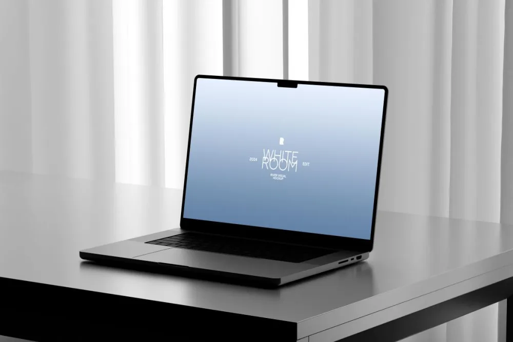 Modern laptop mockup on a sleek black desk with a light blue screen display, positioned in front of soft white curtains. The minimalist setup emphasizes a clean, professional workspace.