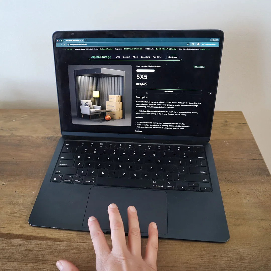 Customer renting an Alpine Storage unit online from a laptop