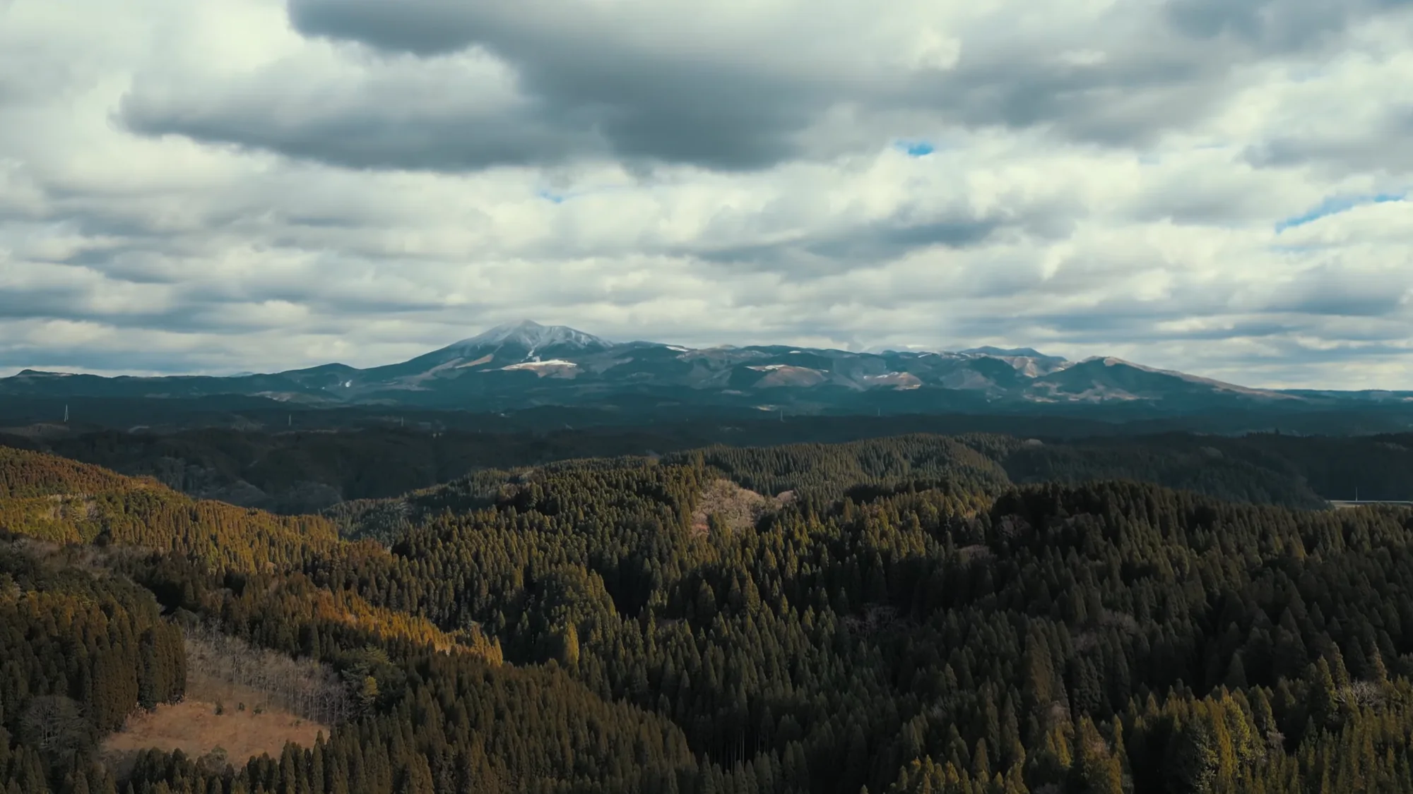 The Aso caldera with its central peaks on the horizon
