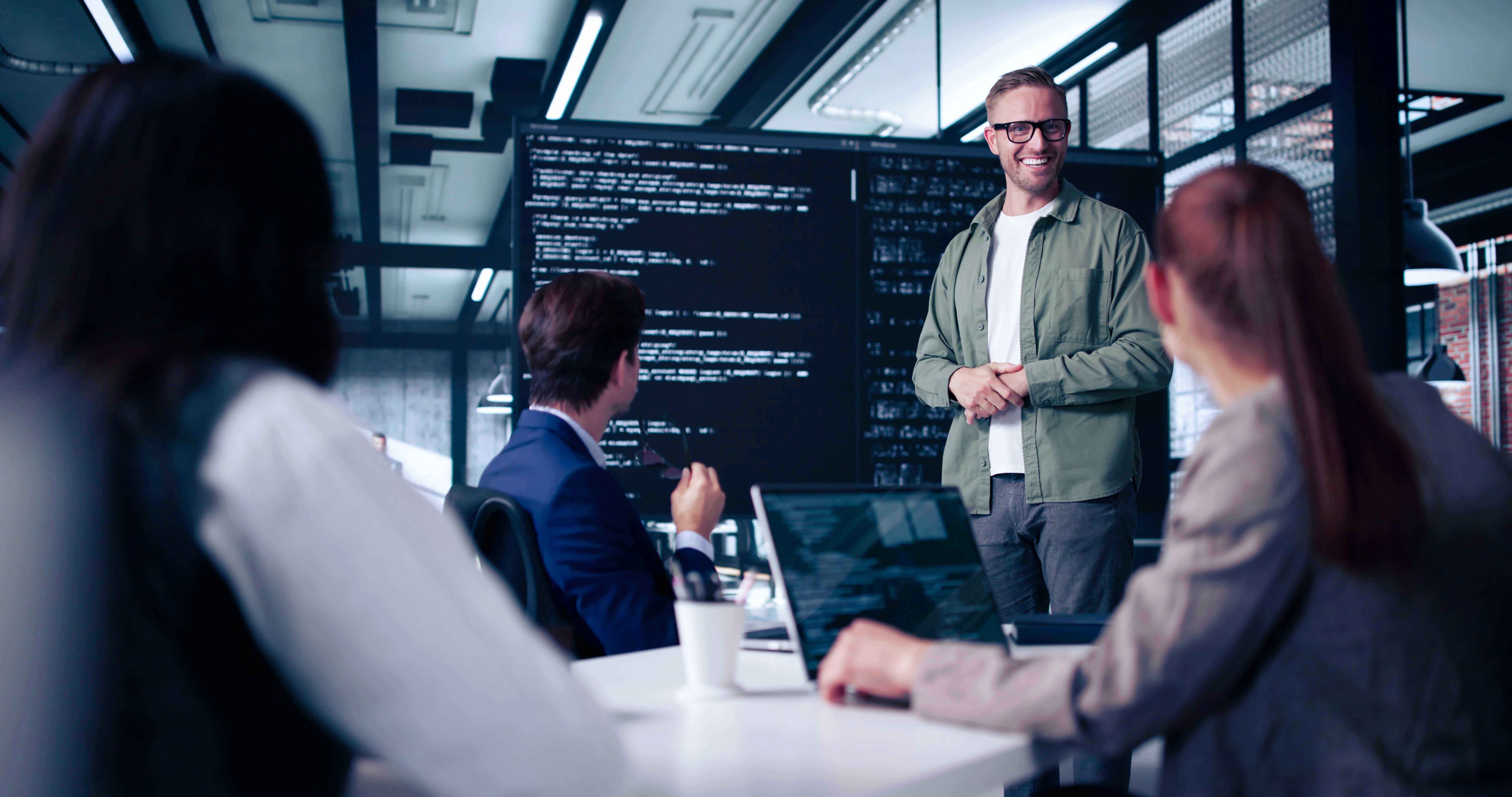 A group of people having a meeting at the office