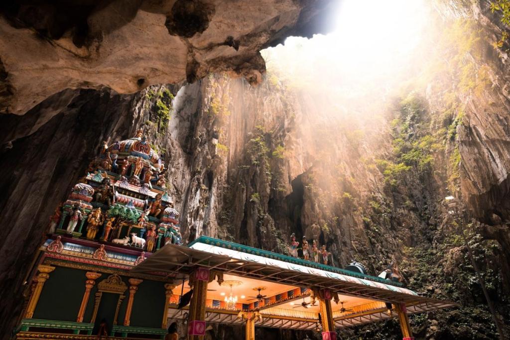 Temples under a sky light within Batu Caves