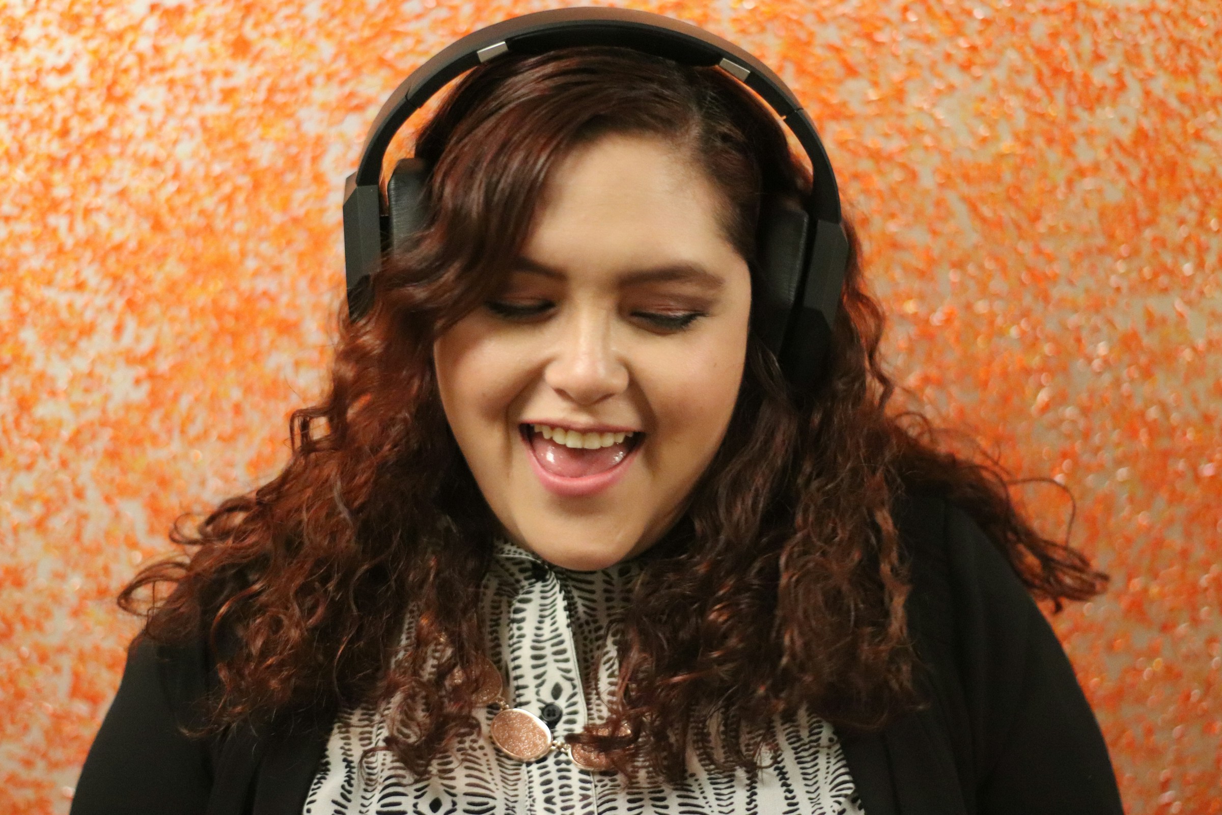 woman enjoying songs - What Is the Most Popular Music Genre in the World