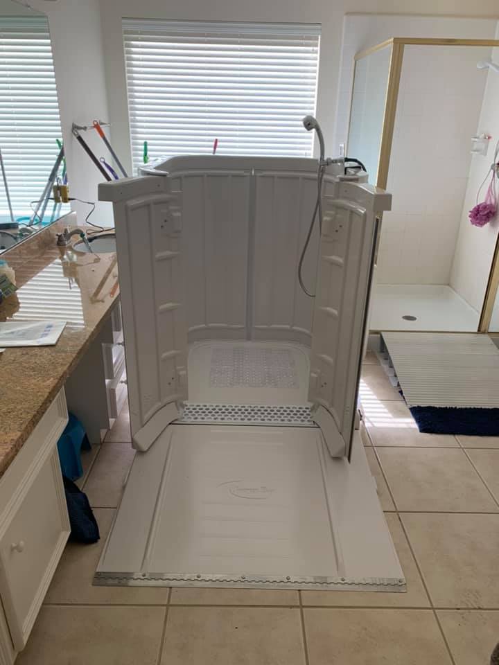 LiveWell portable shower set up in a home