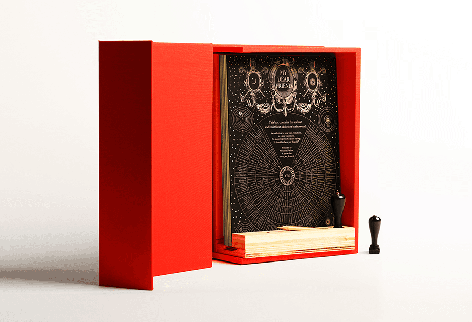 A collection of three books on a white surface: the left book is white with black text saying "YES," the center book is black with gold text stating "SIT DOWN AND DO THE WORK" and "DON'T SELF-CENSOR," and the right book is white with black text highlighting the message "STRUGGLING TO Achieve Perfection Causes Nothing But Stress and Anxiety."