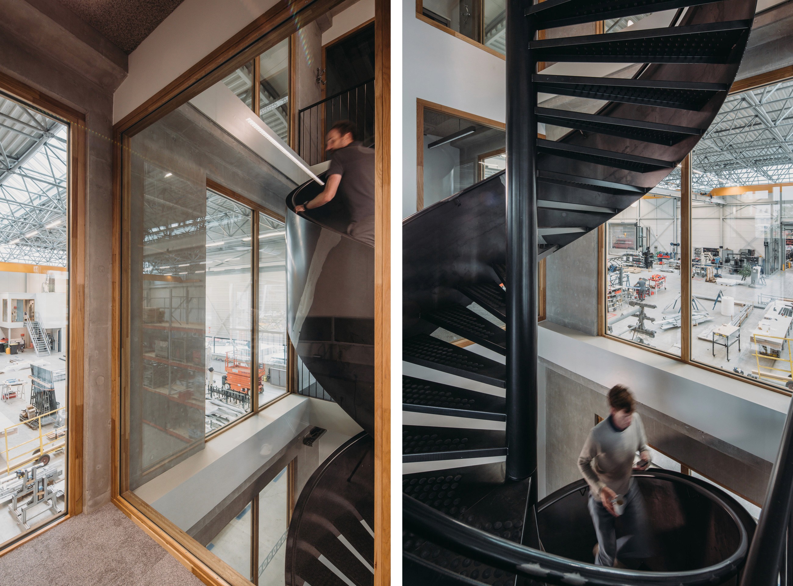 Interior photo of the main stairs, steel frame construction and wooden windows