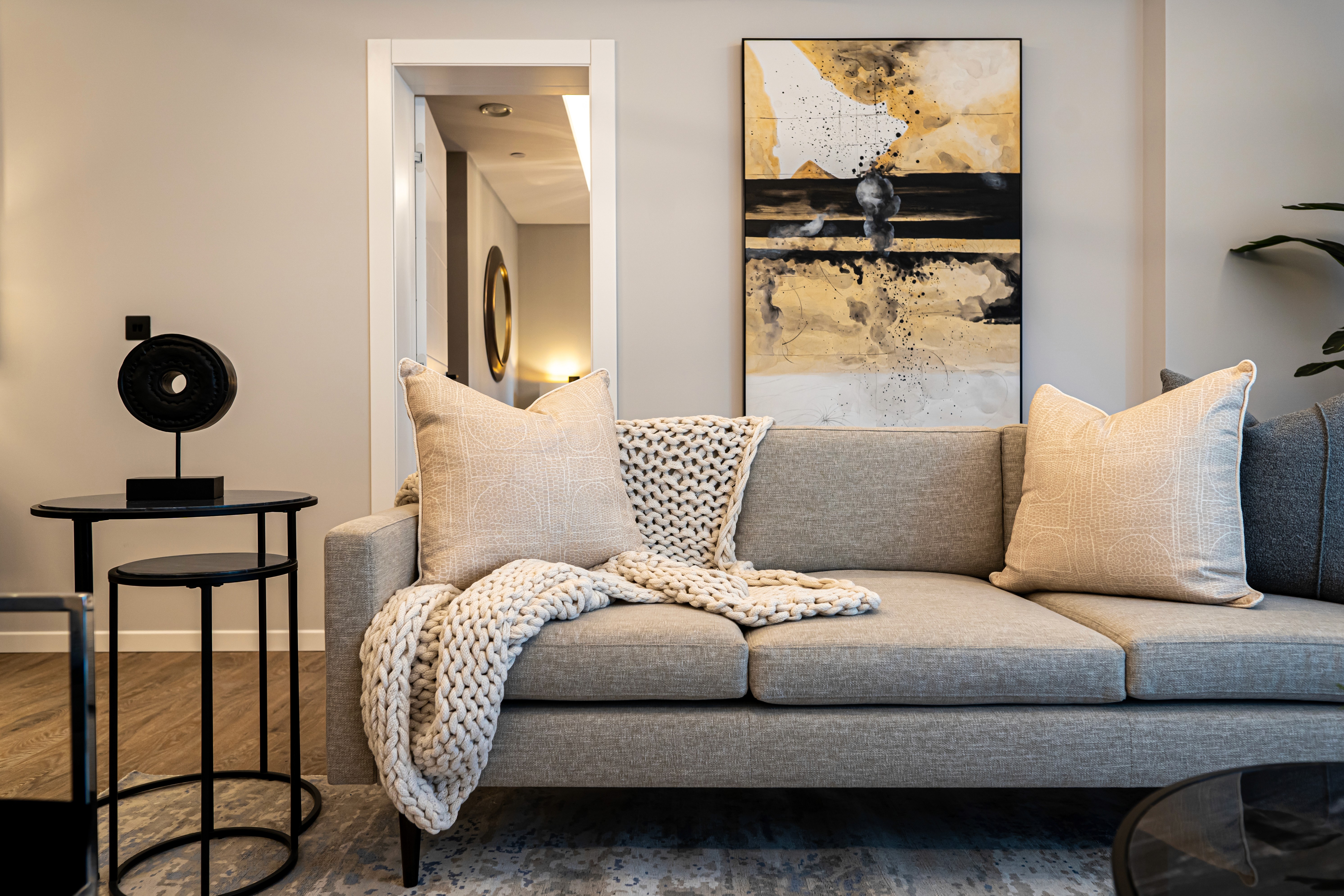 Neutral lounge space in contemporary Manchester show flat interior