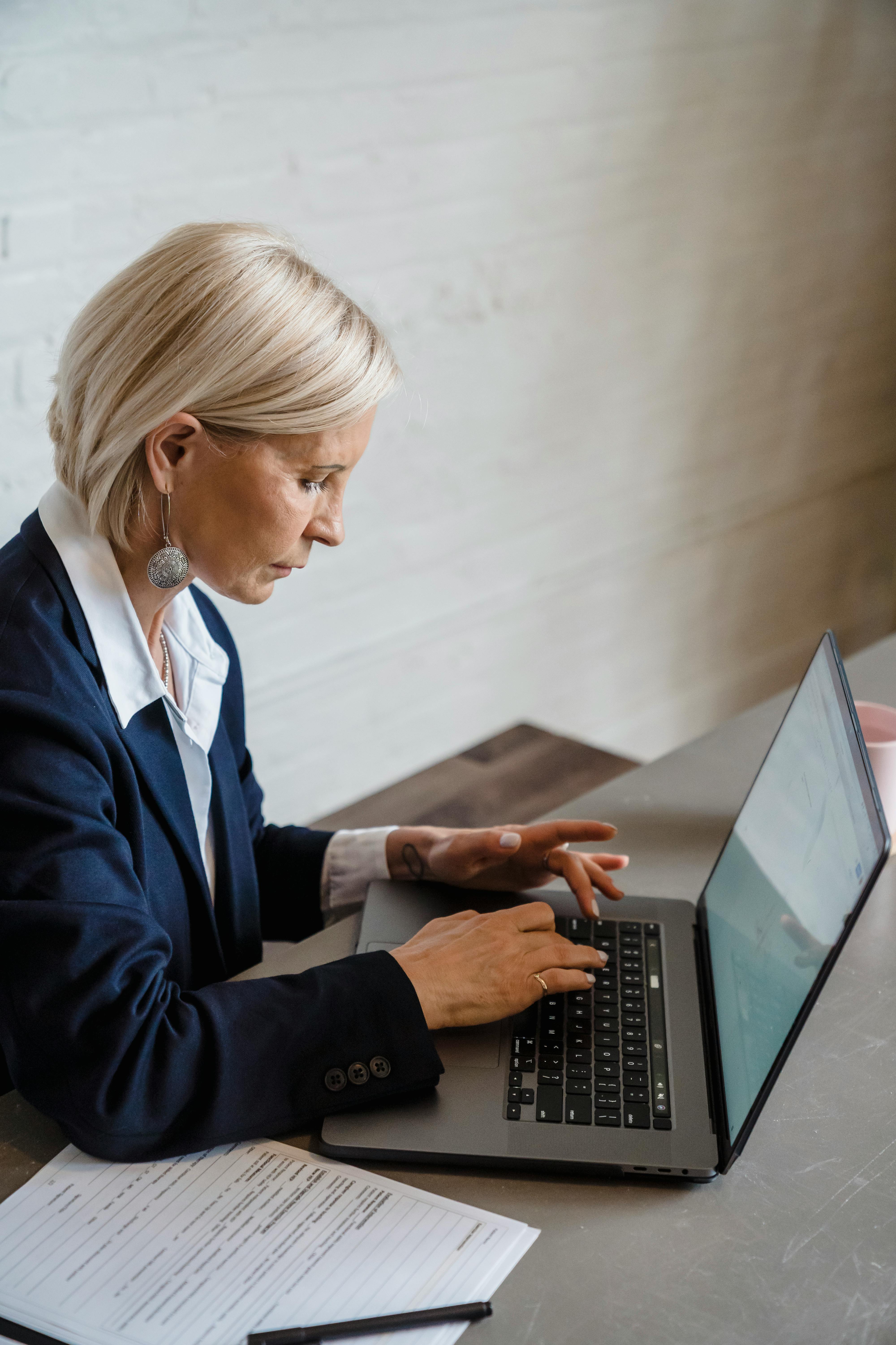 female executive working laptop
