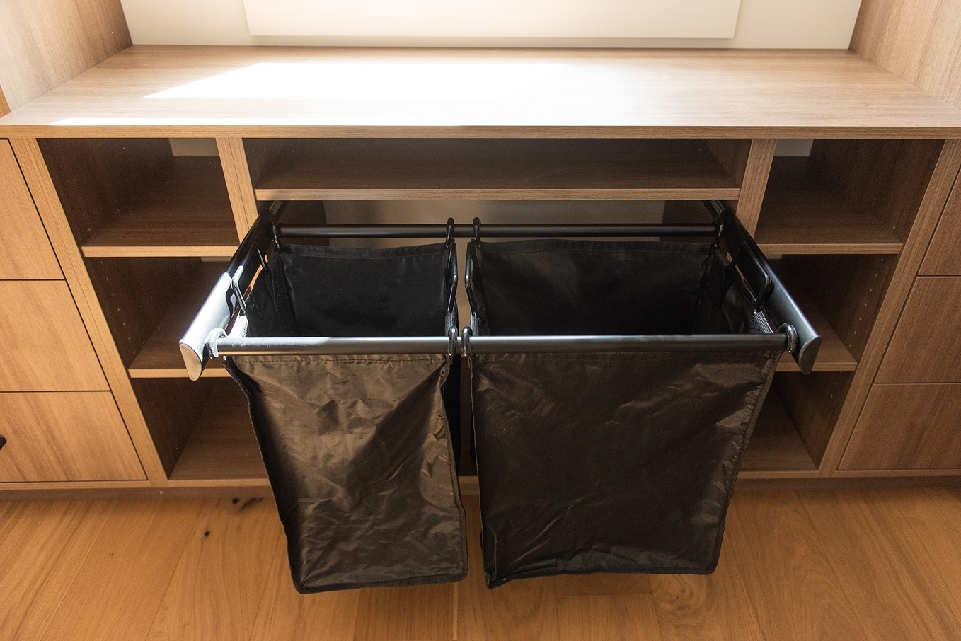 Built-in laundry sorting drawers