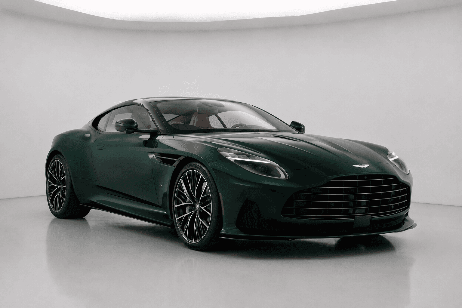 Black Aston Martin coupe with light interior, studio shot