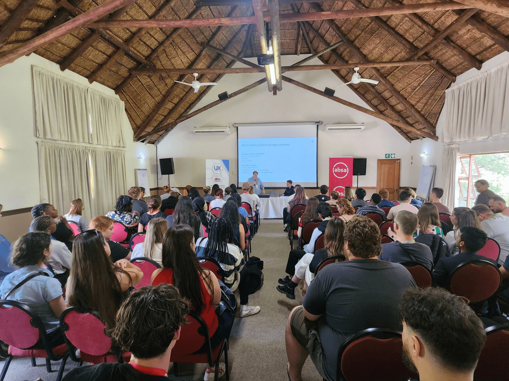 Group Taking a Selfie at a Concert Venue