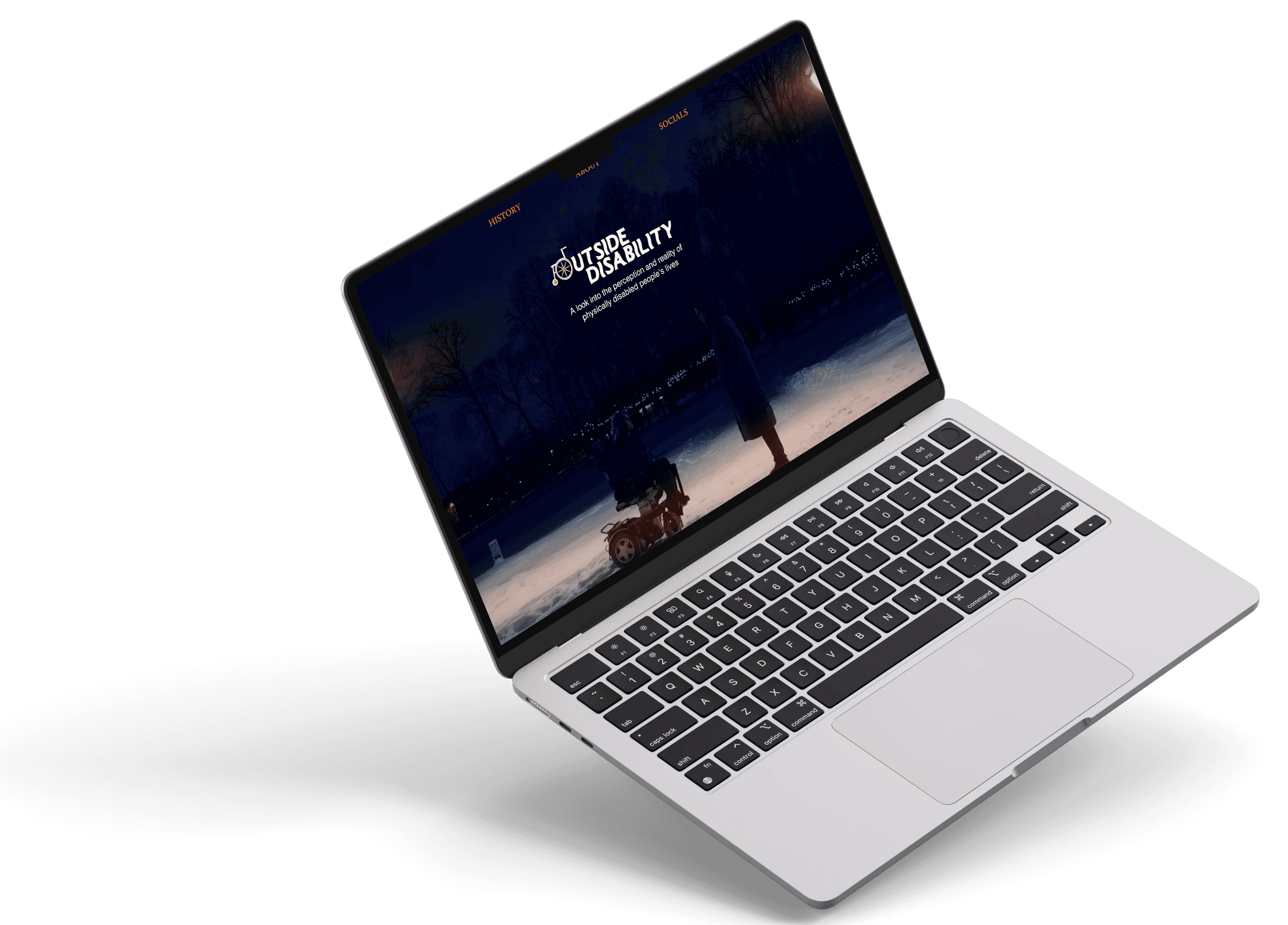 Laptop mockup of our website, showing the landing page that includes our logo and a screenshot of our short film.