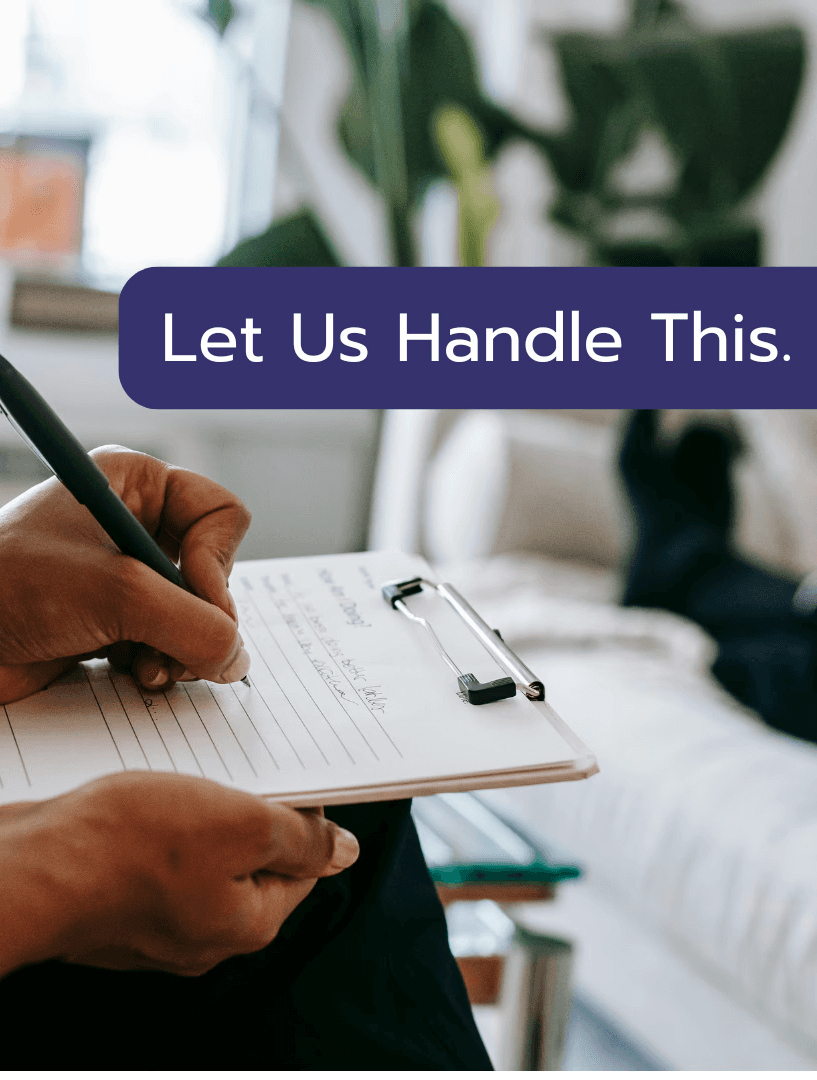 Person writing on clipboard