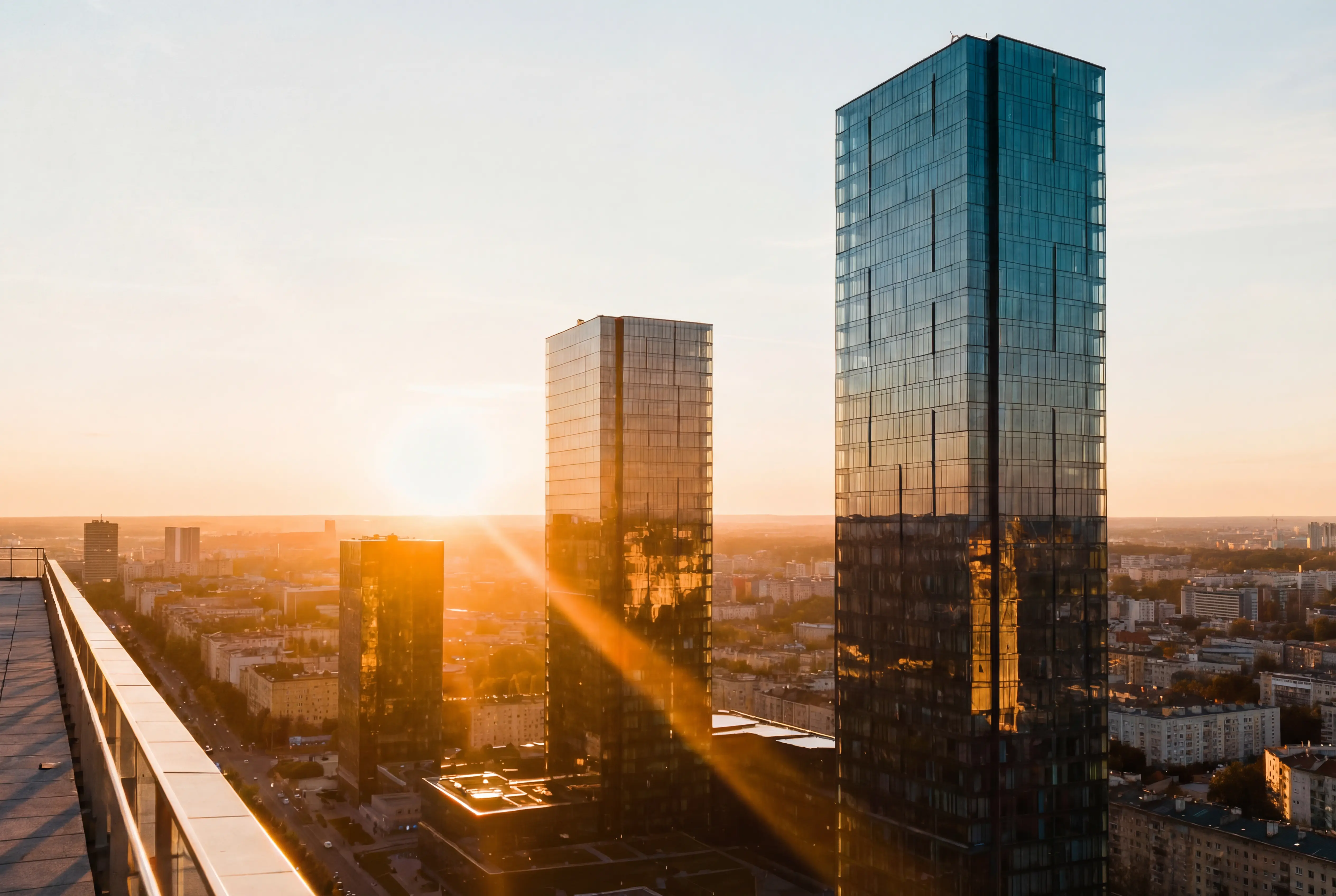 kids lying on a glass land and smiling
