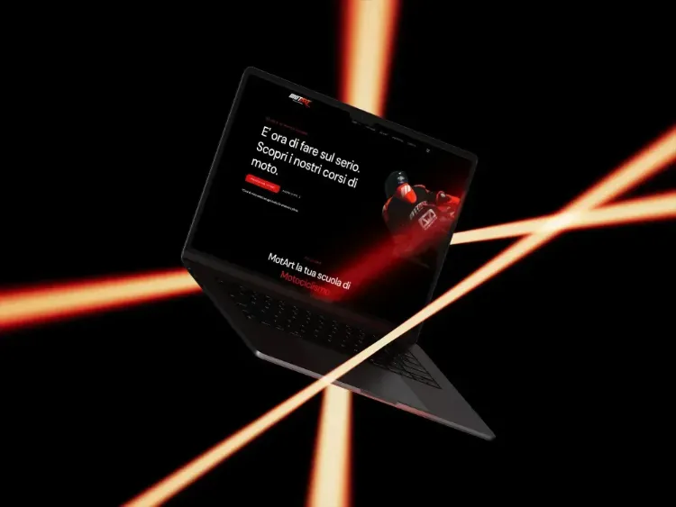 A sleek laptop is displayed against a dark background, illuminated by dynamic orange light streaks.