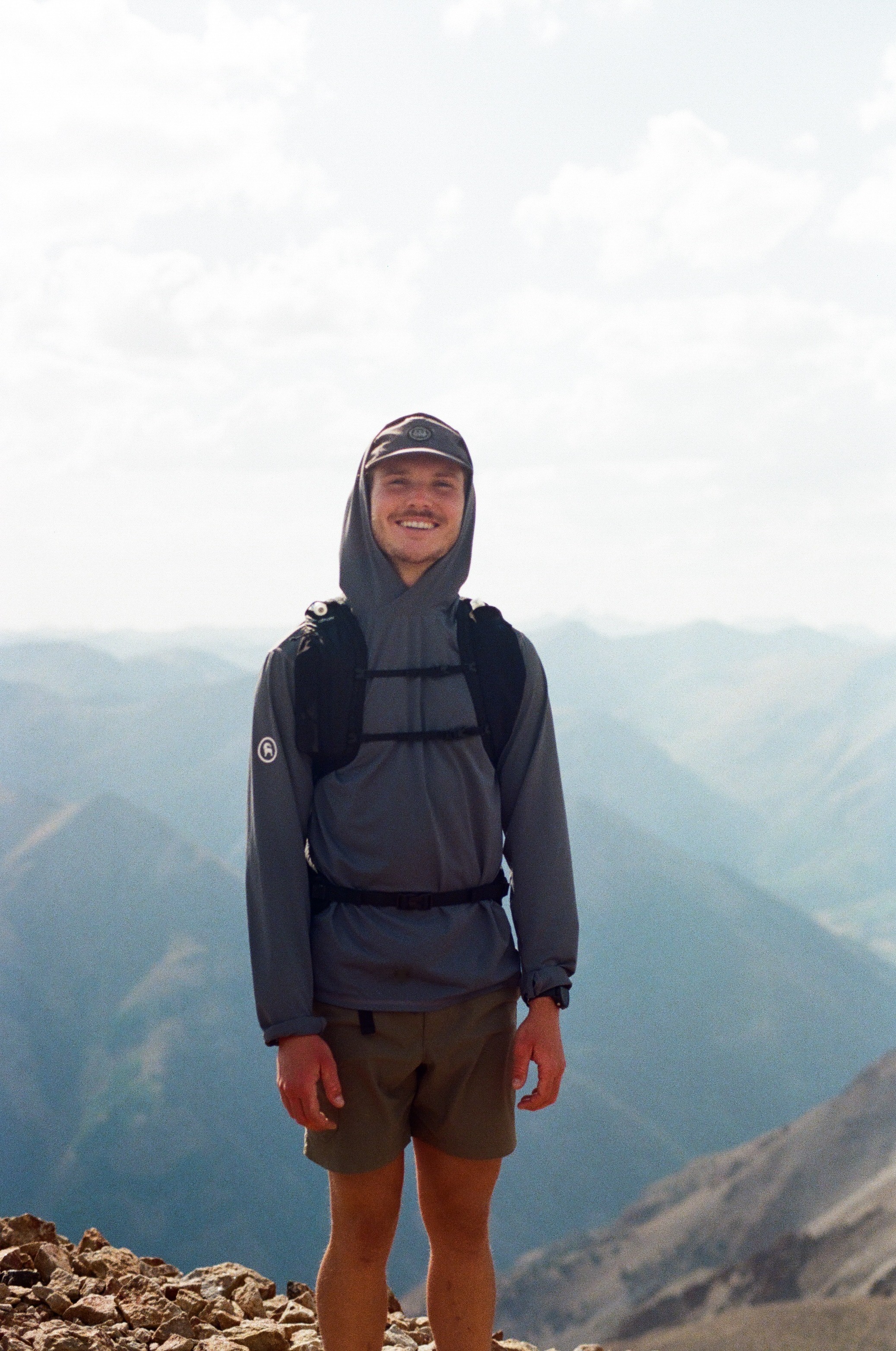man wearing black crew-neck shirt