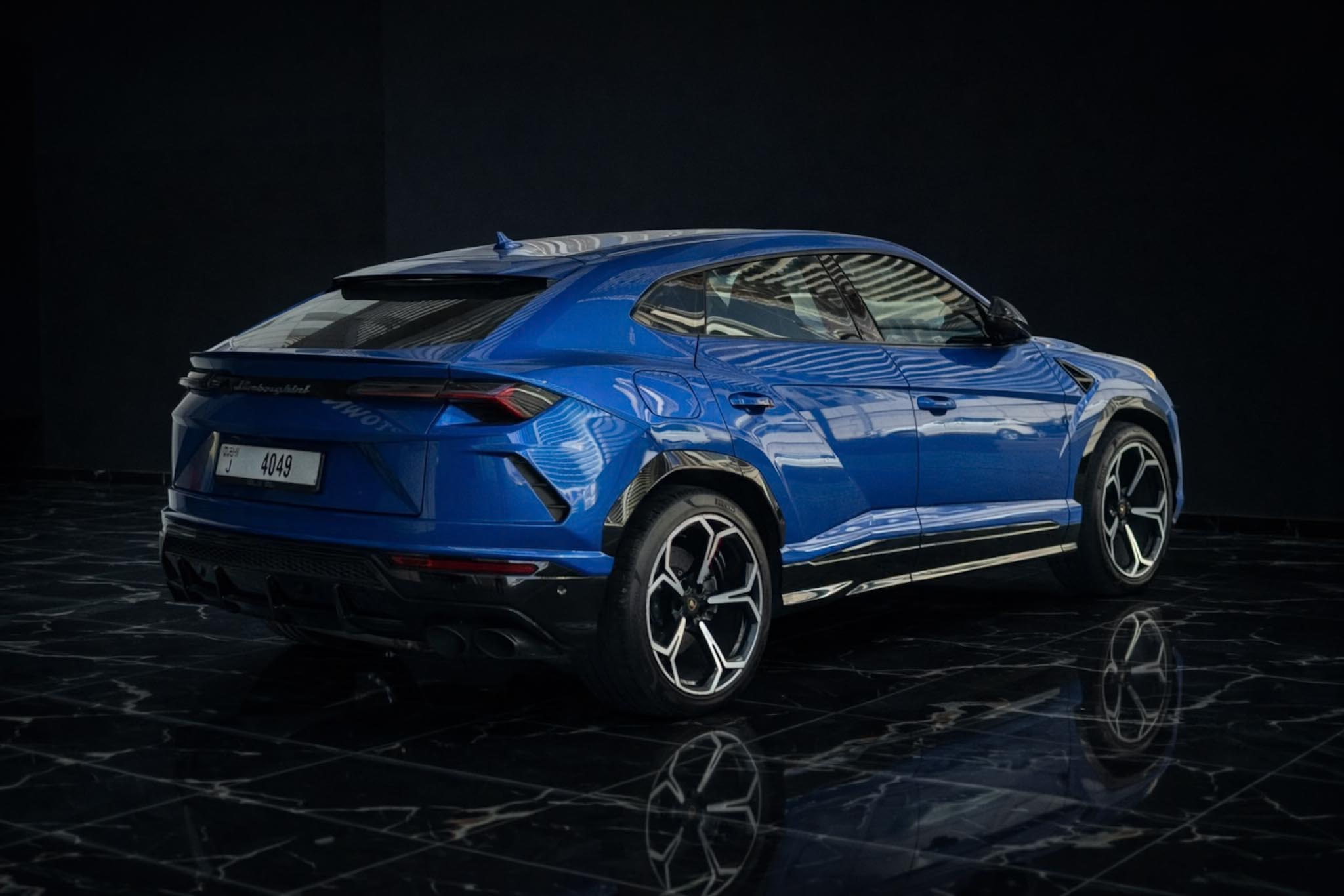 Blue Lamborghini Urus rear view 2022 – premium luxury car rental Dubai Queen of Supercar Rental