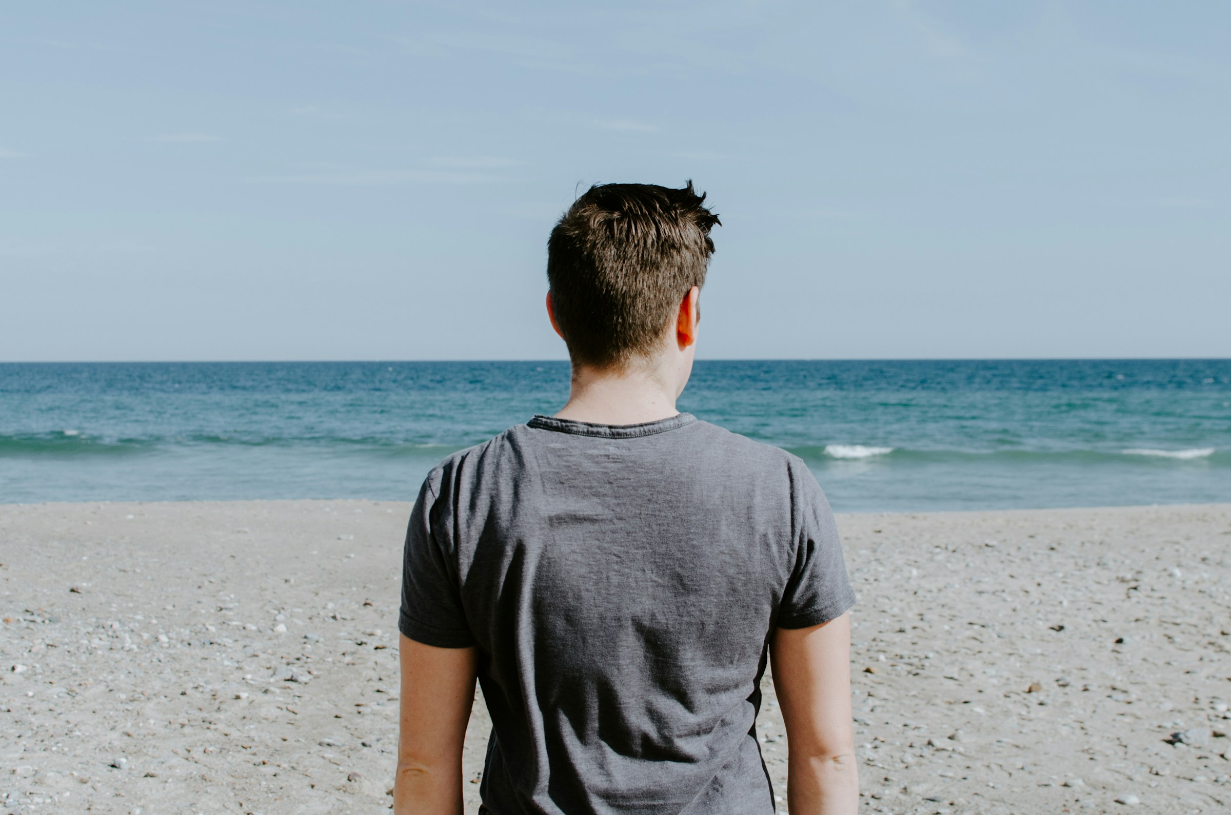 person on a beach - How to Fix Posture