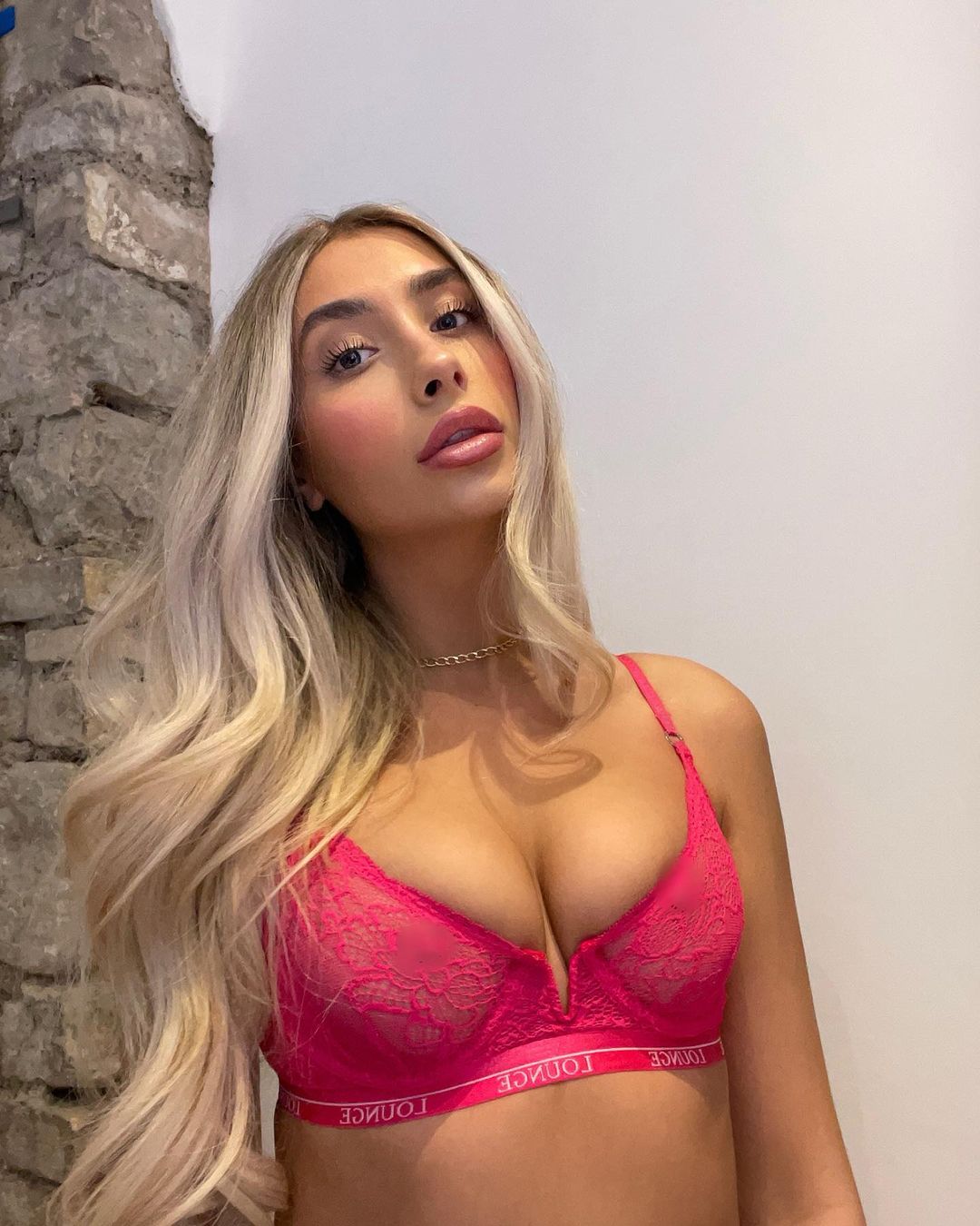 two people looking at a tablet and smiling