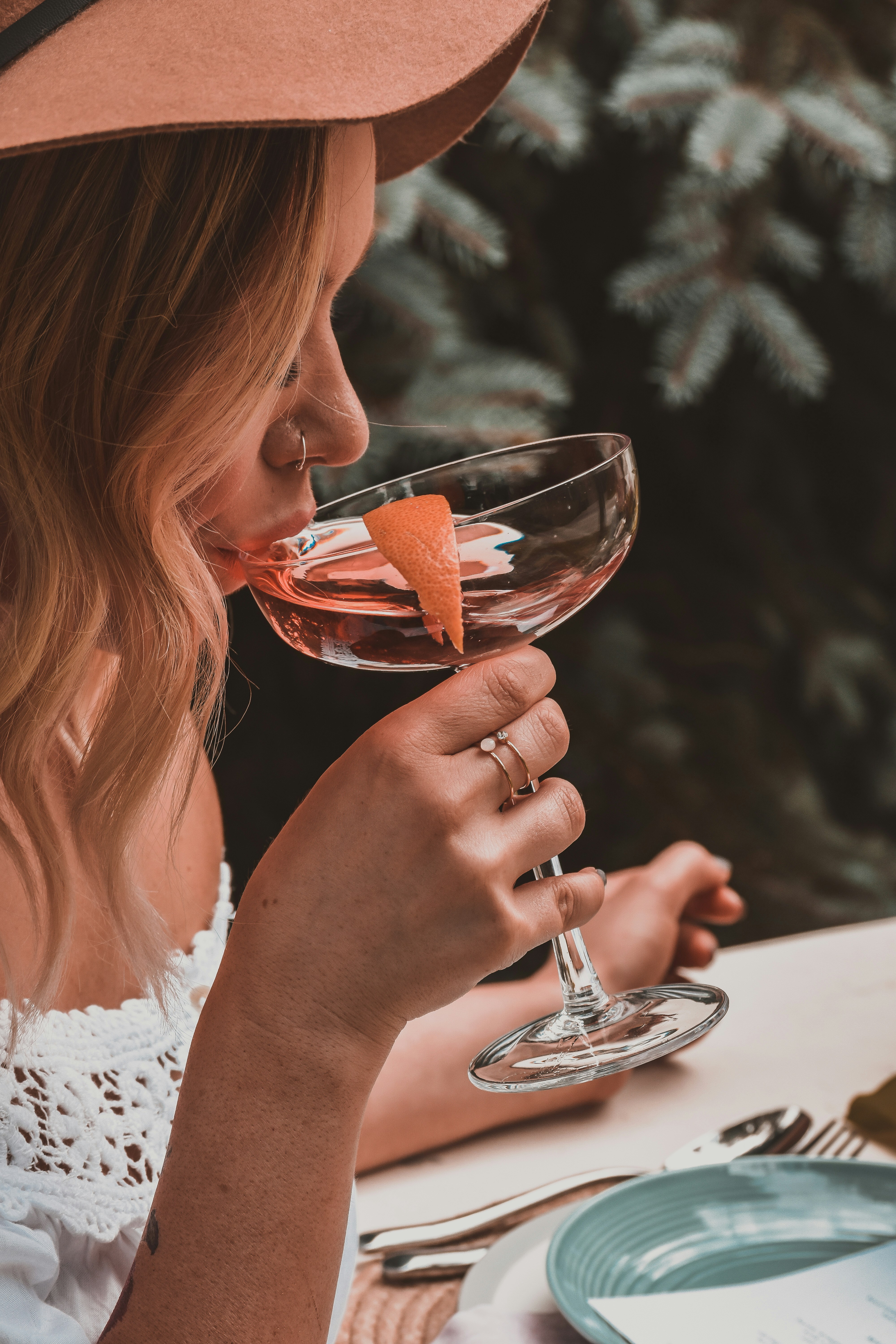 Woman drinking custom cocktail in Phoenix