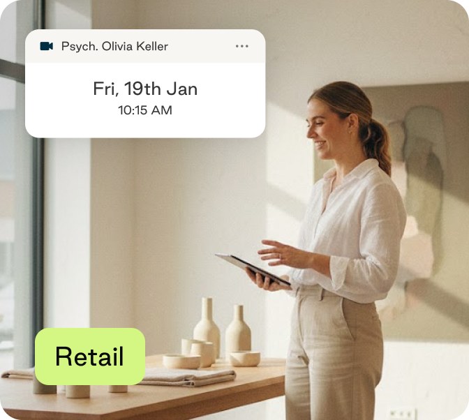 A retail professional using a tablet in a store
