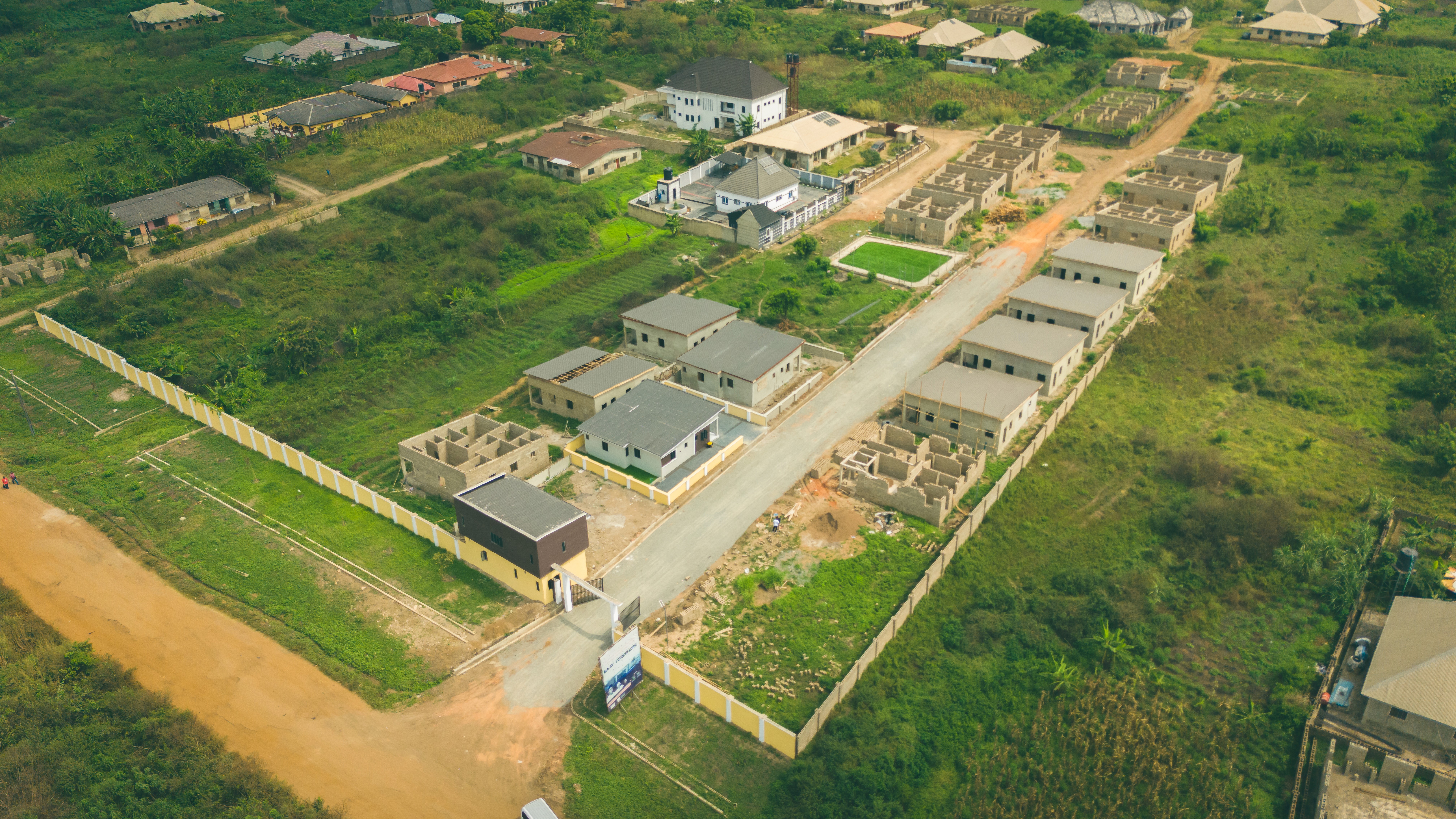 Colorful old buildings with arched doorways and cobblestone street