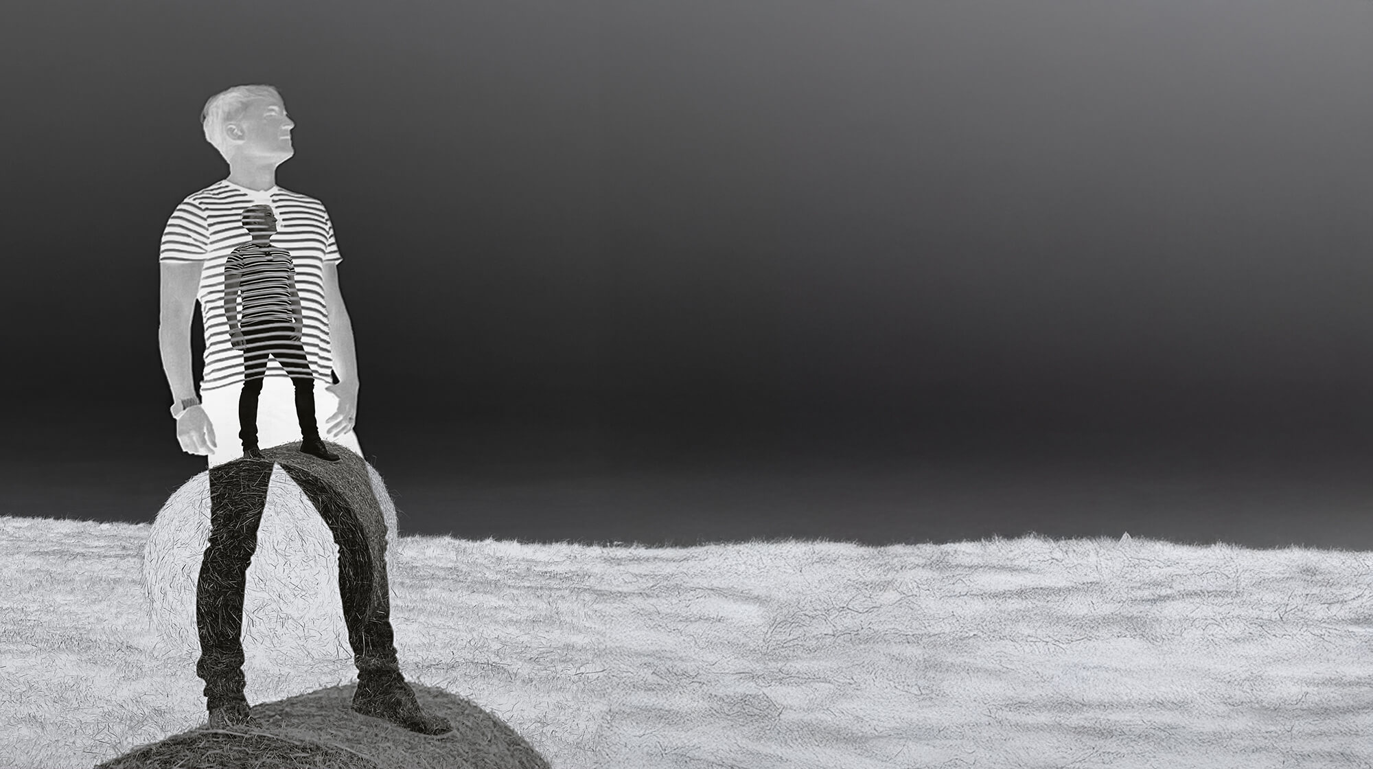 a man holding a cocktail