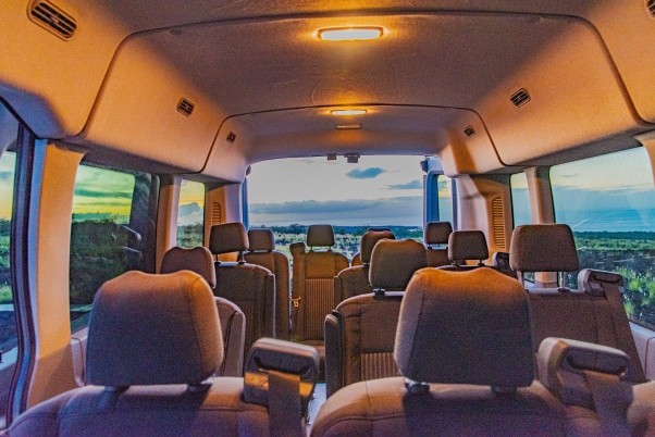 White Ford Transit XLT 15 Passenger Van Hawaii Big Island Sunset For Rent