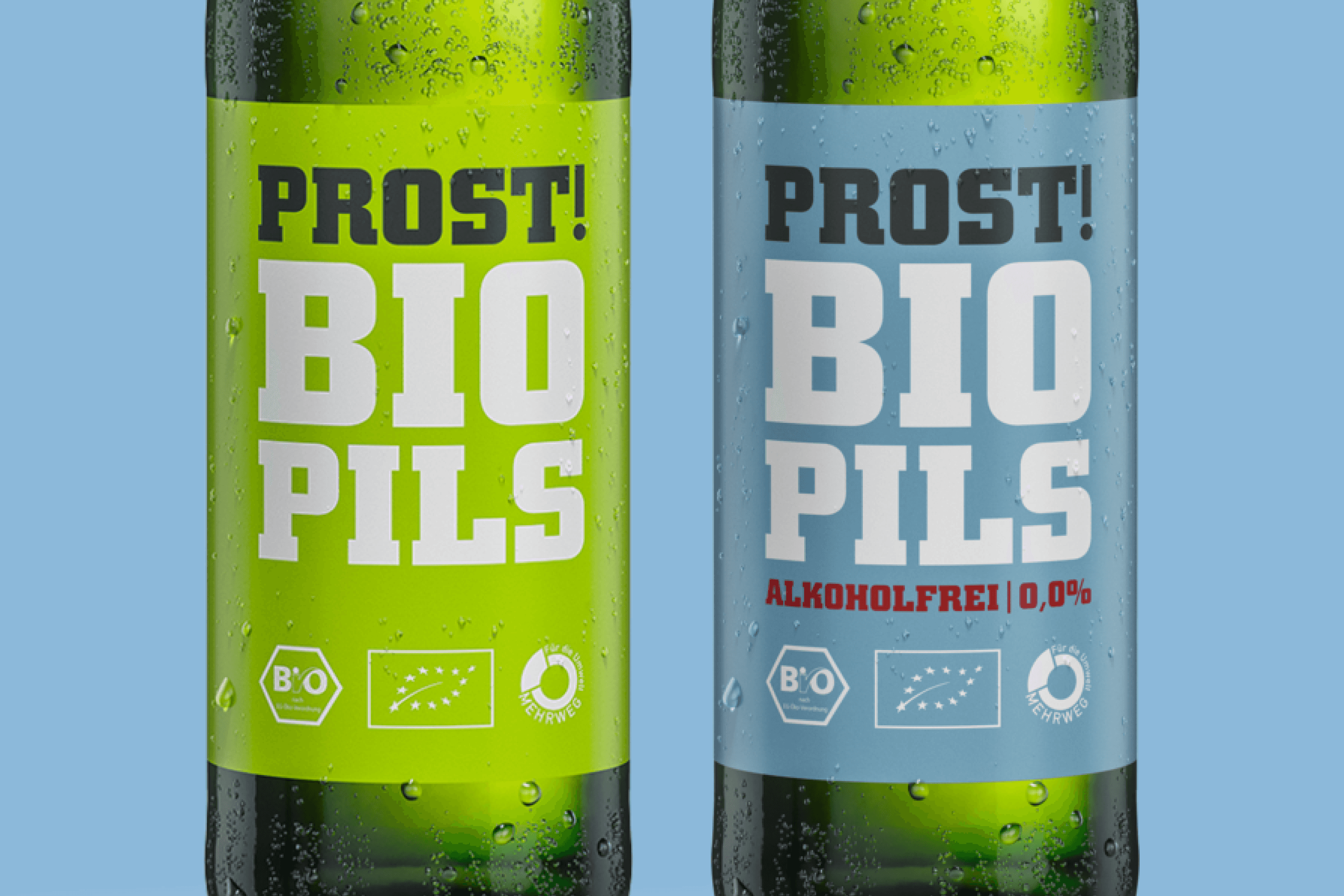 Two bottles of Proost Bio Pils, one green and one blue.