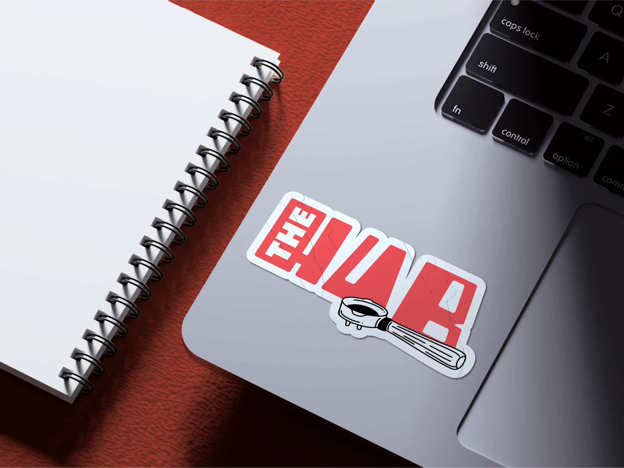 The Hub. Brand design project sticker on laptop.