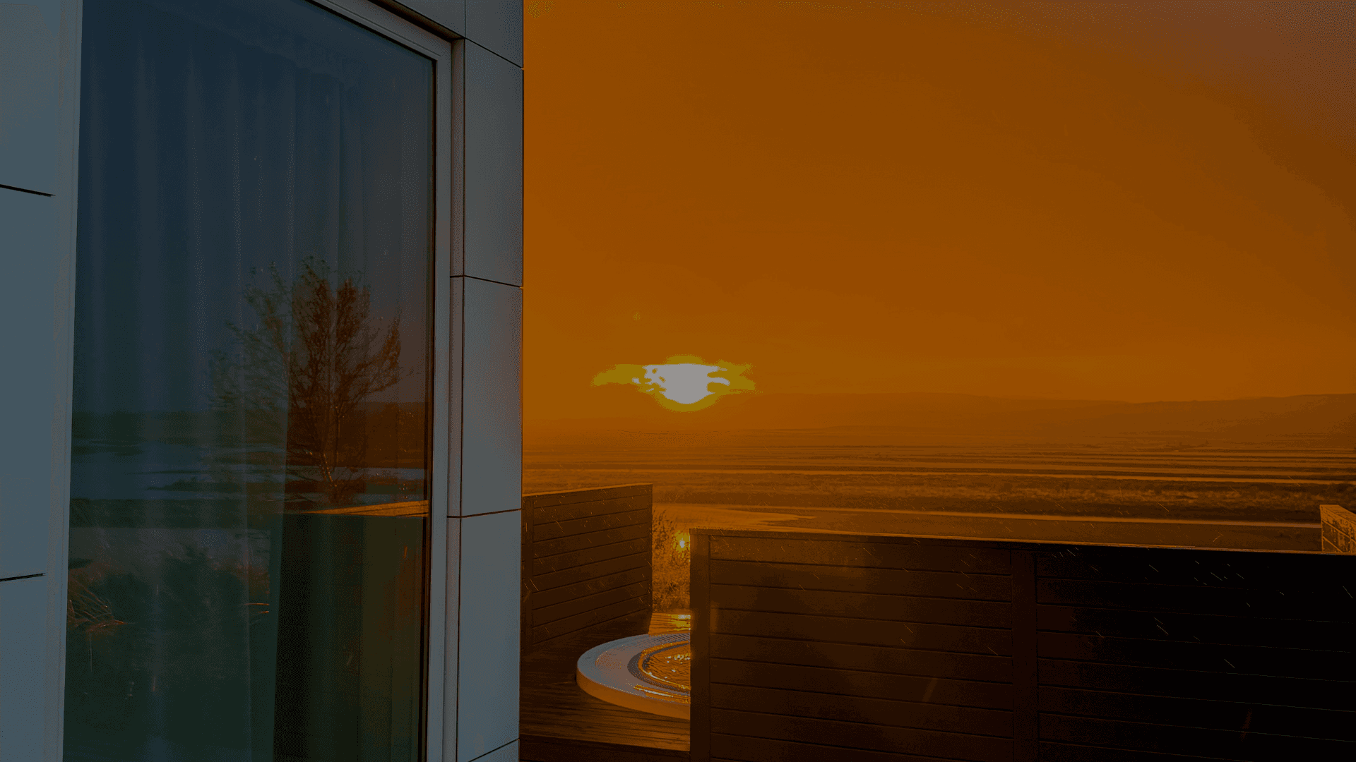 A large christmas tree in front of a tall building