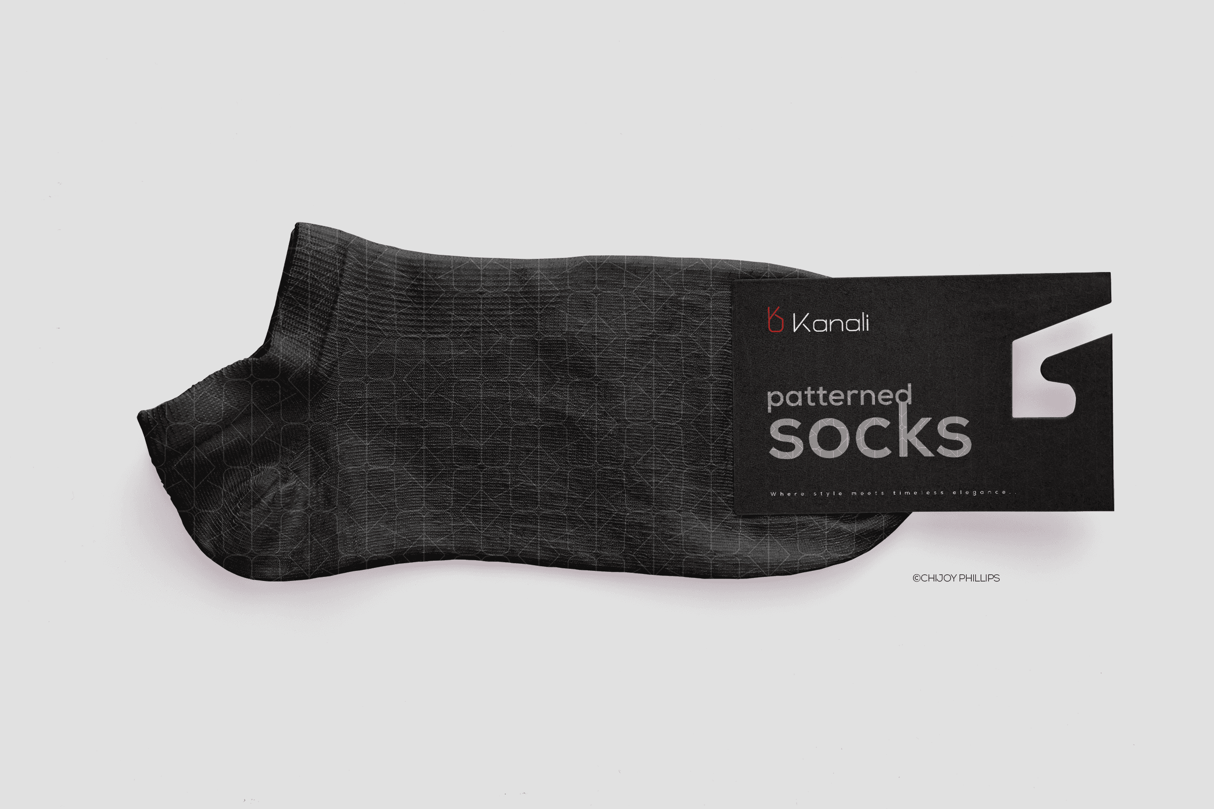Kanali Brand Identity _ Branded Socks
Black sock with a subtle pattern and a label featuring the brand name.