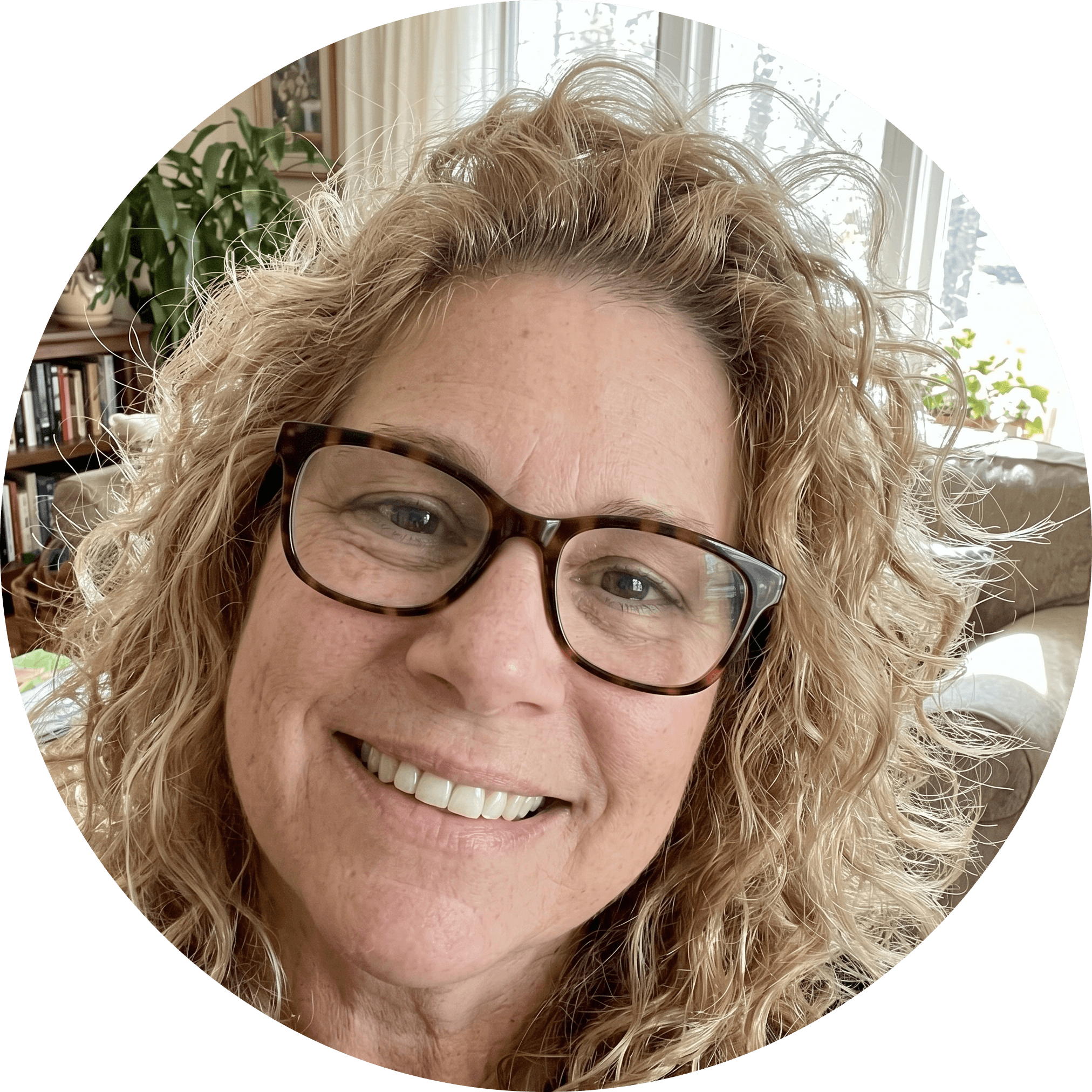 A person in a blacl coat and the brown hairs